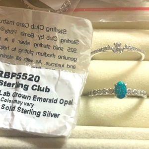 Beautiful Bomb Party Sterling Club lab created emerald Opal. Two rings size 9